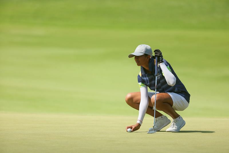 Aditi Ashok of Team India lines up her putt on the second green during the third round of the Women&#039;s Individual Stroke Play at Tokyo 2020 Olympic Games