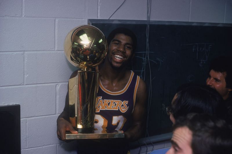 Magic Jonson with the Larry O&#039;Brien trophy. Photo Credit: Focus on Sport via Getty Images