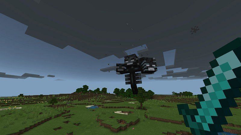 The Wither boss being spawned in the Minecraft overworld (Image via Minecraft)