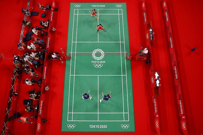 A badminton match in progress at the Tokyo Olympics