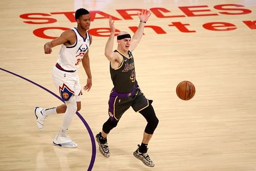 Alex Caruso #4 reacts to a play against PJ Dozier #35