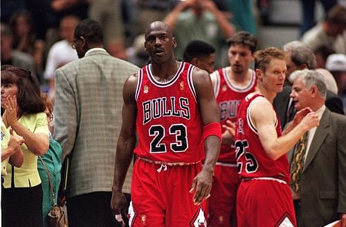 Michael Jordan (#23) walks on the court during the NBA Finals.