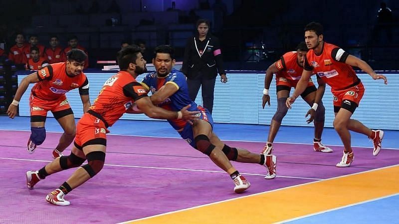 Mahender Singh bulldozing his opponent with his signature dash tackle (Image - PKL)