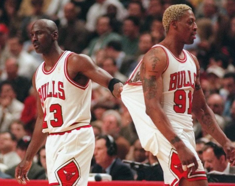 Michael Jordan (#23) pulls Dennis Rodman (#91) aside during the 1997-98 season [Photo by Fred Jewell/Associated Press]
