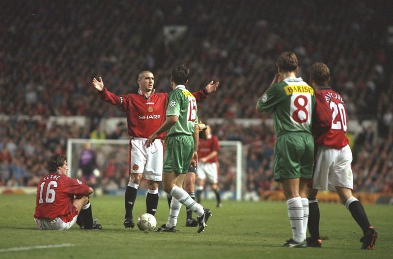 Eric Cantona of Manchester United (centre) pleads his innocence...