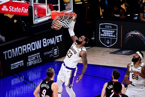 LeBron James #23 dunks the ball during a game against the Miami Heat