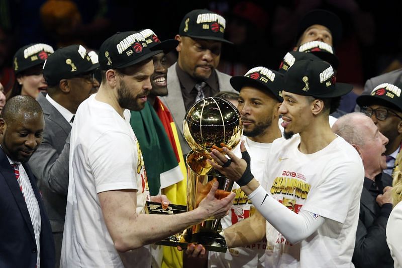 Danny Green (right) lifts the NBA Championship in 2019