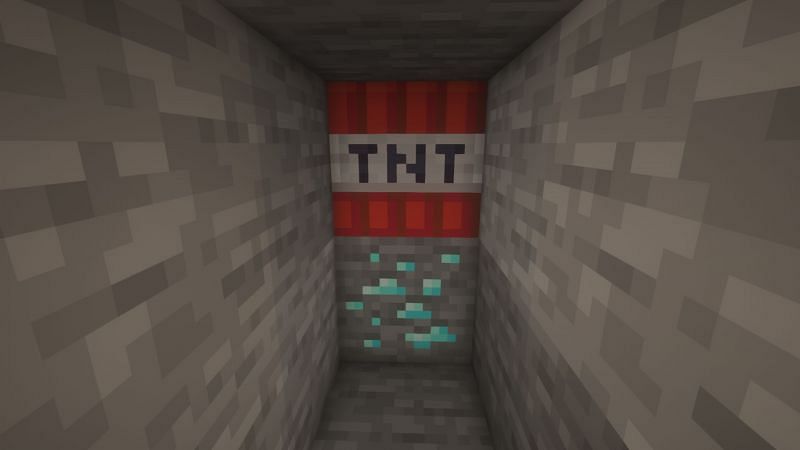 A TNT block above a diamond ore (Image via Minecraft)