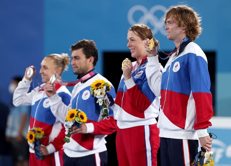 L-R: Elene Vesnina, Aslan Karatsev, Anastasia Pavlyuchenkova and Andrey Rublev on the podium