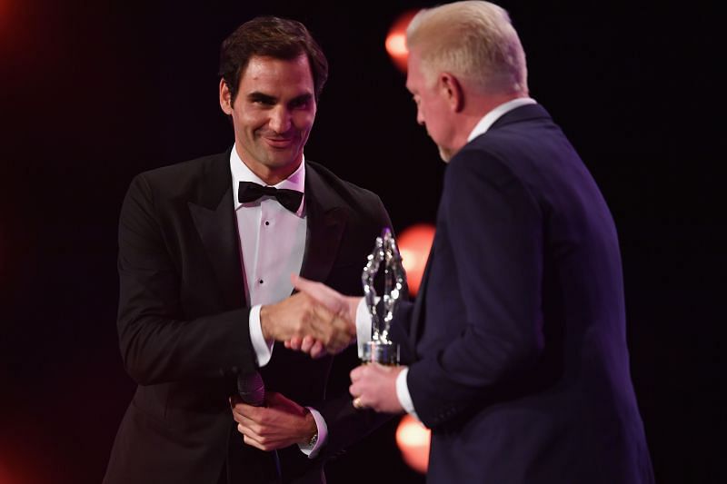 Roger Federer accepts the Laureus World Comeback of the Year from Laureus Academy member Boris Becker during the 2018 Laureus World Sports Awards show in February 2018 in Monaco