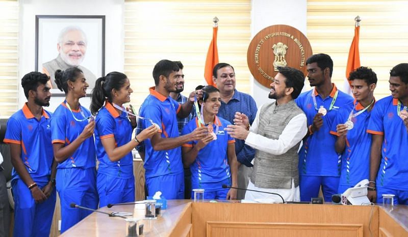 Sports Minister Anurag Thakur with the U20 athletes.