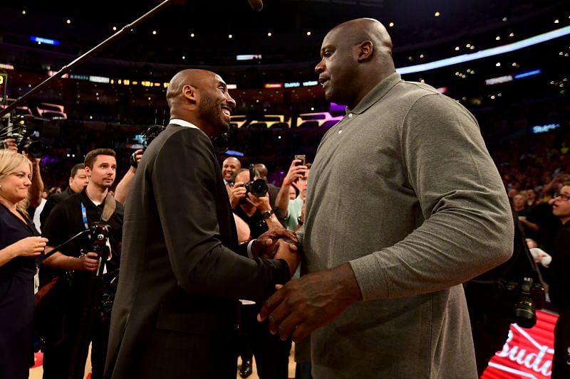 Kobe Bryant (left) and Shaquille O&#039;Neal greet each other before an NBA game.