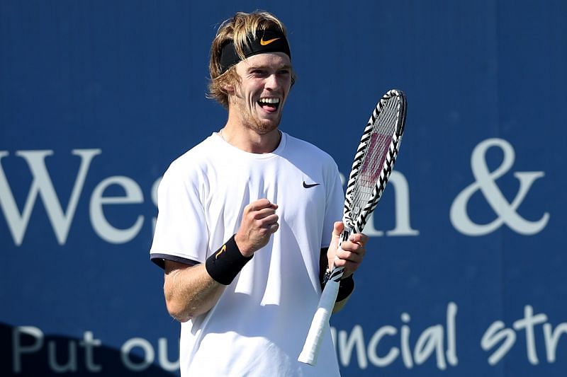 Andrey Rublev celebrates after beating Roger Federer at the Western and Southern Open in August 2019
