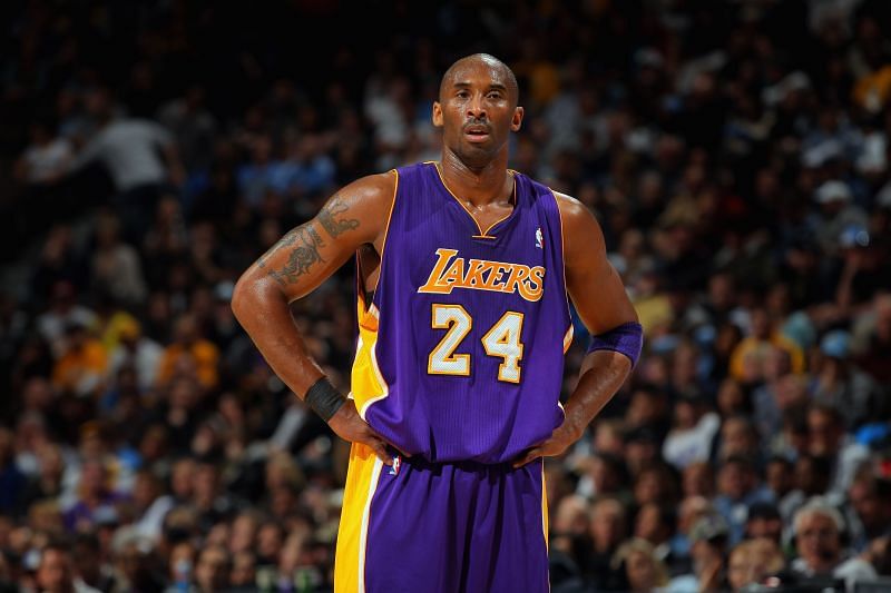Kobe Bryant #24 looks on during a break in the action.