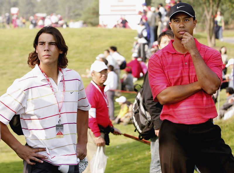 Rafael Nadal standing next to Tiger Woods