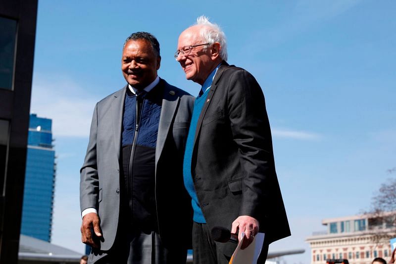 Rev. Jesse Jackson Sr. with Bernie Sanders (Image via Getty Images)