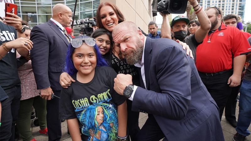 Triple H and Stephanie McMahon with the WWE Universe