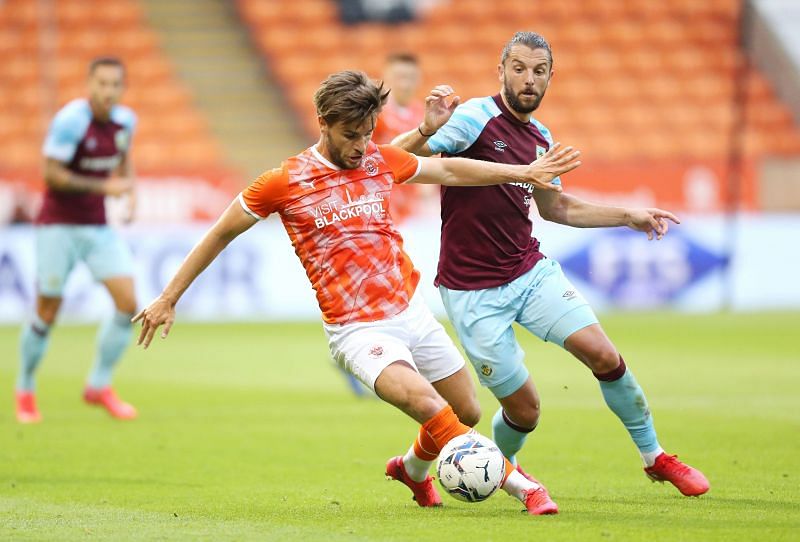 Blackpool play Bristol City in an EFL Championship game on Sunday