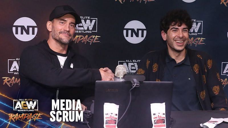 CM Punk and Tony Khan at AEW Media Scrum