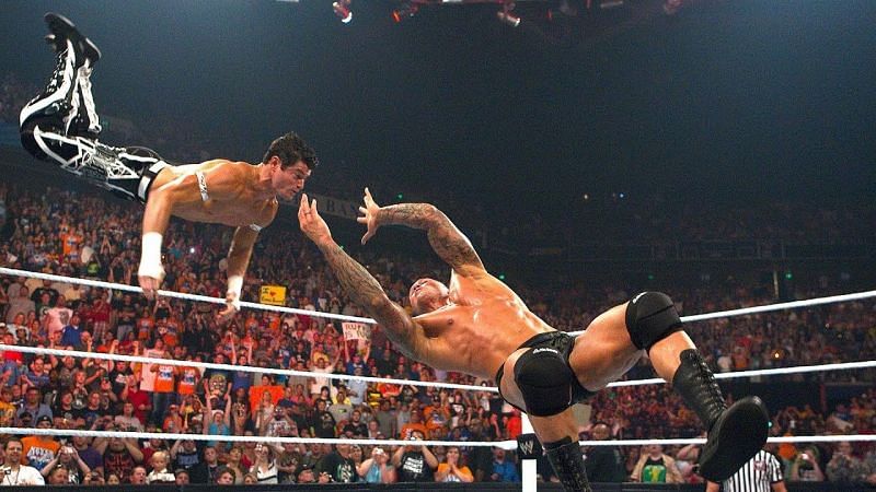 Randy Orton hitting an RKO on Evan Bourne.
