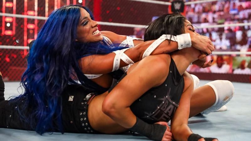 Sasha Banks and Bayley tear it up inside the cell