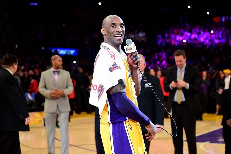 Kobe Bryant #24 addresses the crowd after scoring 60 points in his final NBA game.