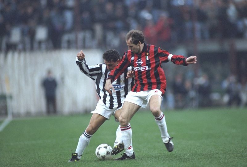 Roberto Baggio of Juventus and Franco Baresi of AC Milan