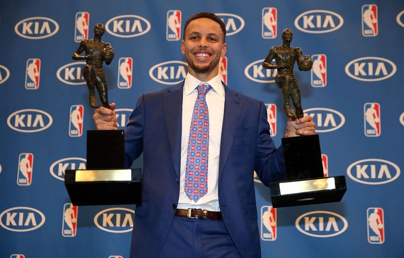Stephen Curry with his two NBA MVP tophies