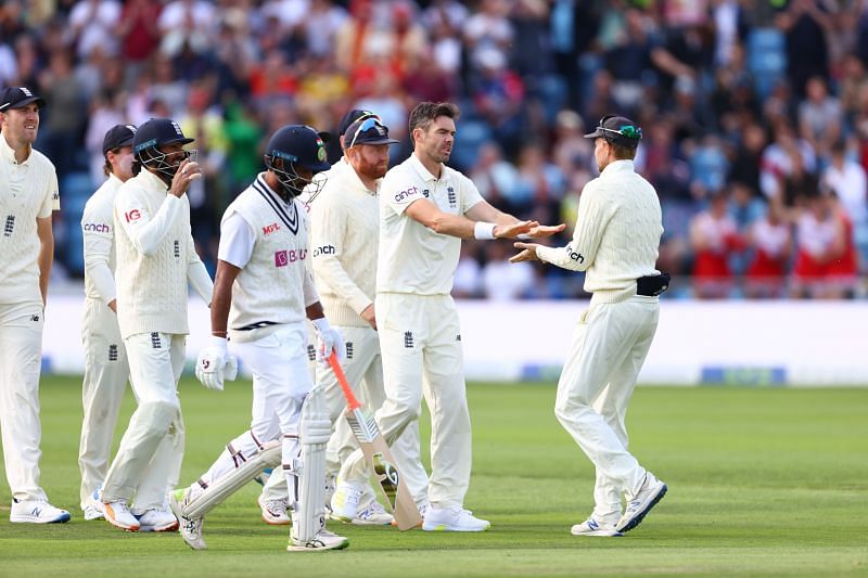 Cheteshwar Pujara departs after a soft dismissal as England players celebrate