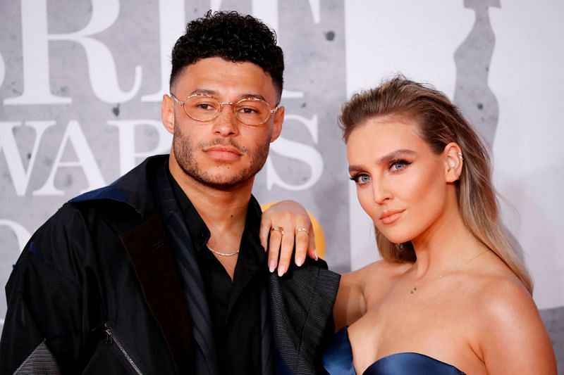 Perrie Edwards with boyfriend, Alex Oxlade-Chamberlain. (Image via Getty Images)