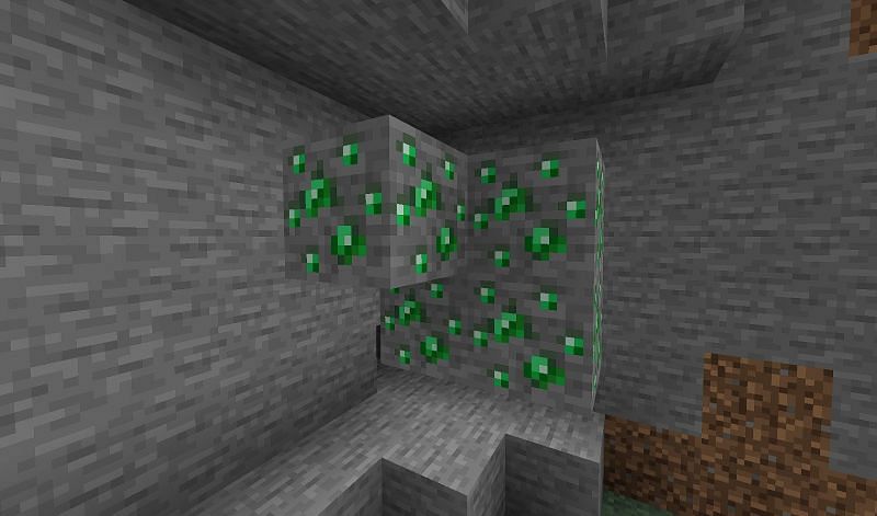 Emerald ore in the game (Image via Minecraft)