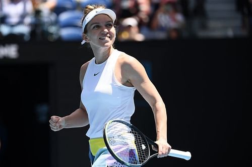 Simona Halep reacts after winning a point