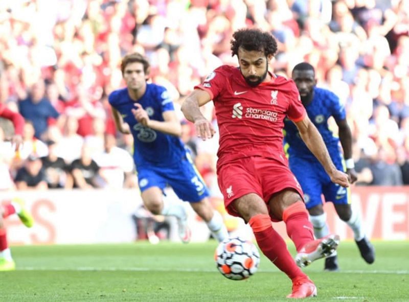 Mohamed Salah lashed home a penalty to ensure a share of the spoils at Anfield.