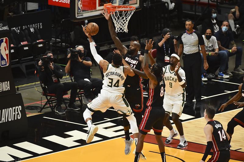 Dewayne Dedmon defends Giannis Antetokounmpo.