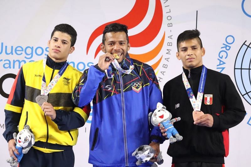 Tigreros Urbano (extreme left) will be Ravi Dahiya&#039;s opponent in the first round