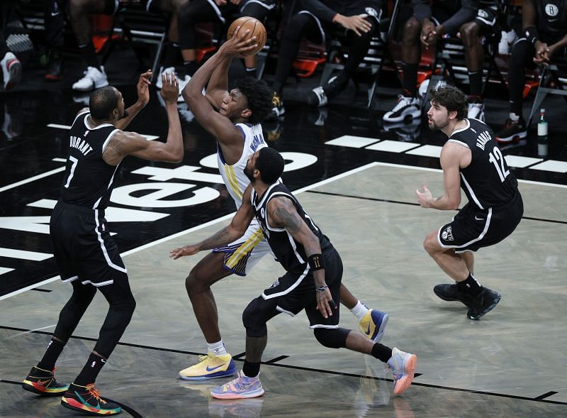 James Wiseman #33 shoots against the Nets.