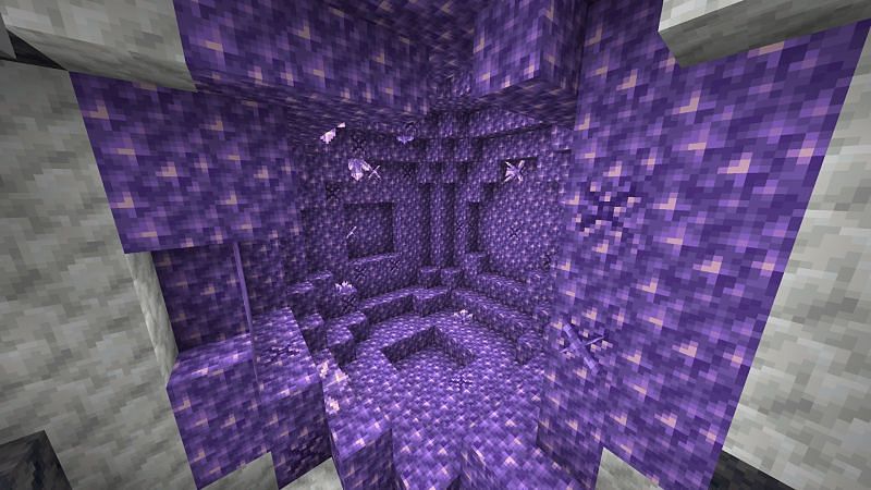Amethyst spawns in geodes, which are found underground, and can have lots of uses. (Image via Minecraft)