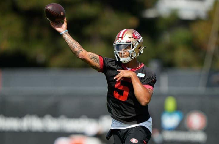 Trey Lance slings a pass in his first training camp in the NFL.