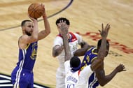 Stephen Curry #30 of the Golden State Warriors shoots a three-point basket .