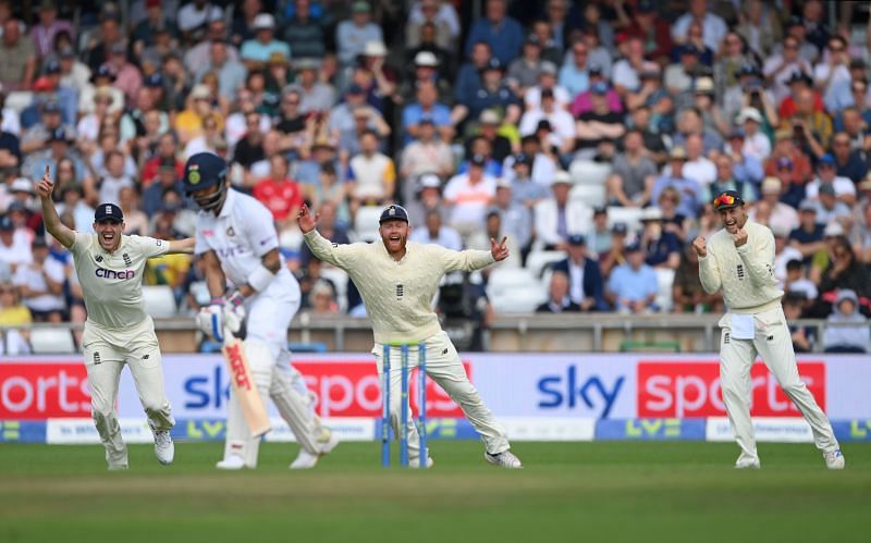 England cricket team celebrates the wicket of Indian captain Virat Kohli. Pic: Getty Images