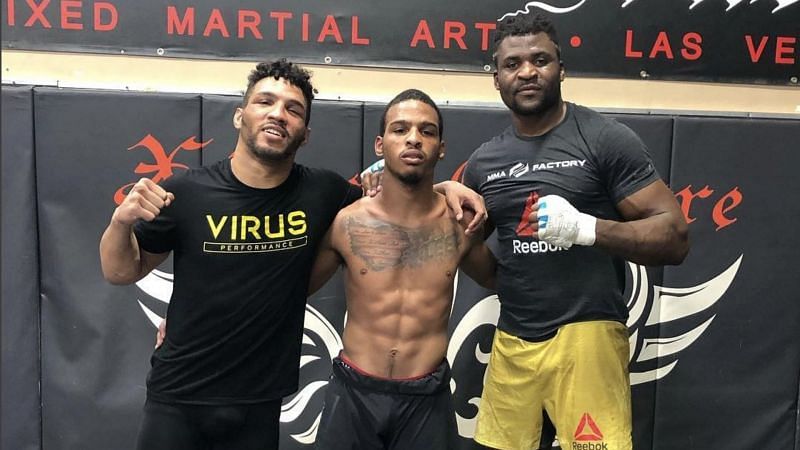Brothers Kevin Lee and Keith Lee pose with UFC champ Francis Ngannou [Photo via @keith_lee125 on Instagram]