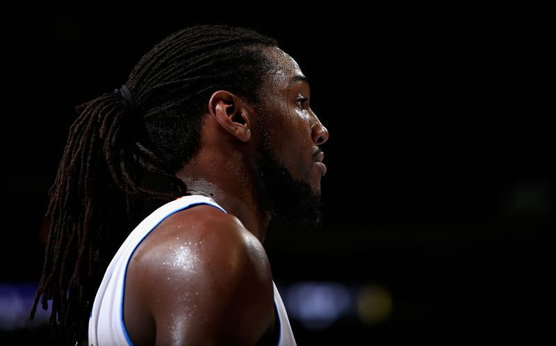 Kenneth Faried #35 looks on during a break in the action