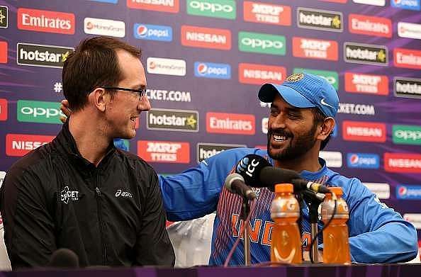 MS Dhoni interacts with a journalist after India