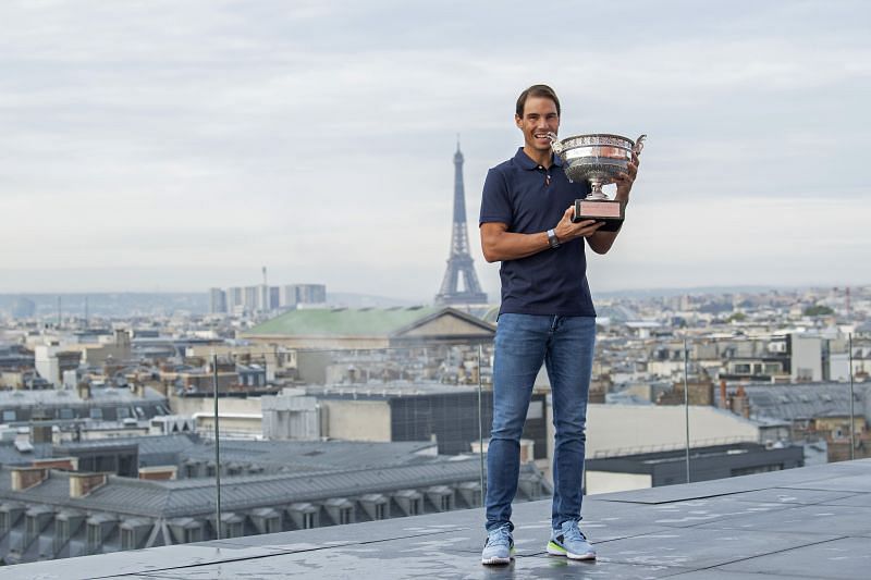 Rafael Nadal poses with his 20th Grand Slam title in Paris