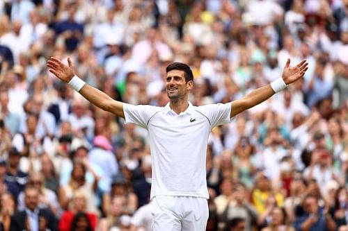 Novak Djokovic celebrates winning Wimbledon 2021 at All England Lawn Tennis and Croquet Club in July 2021