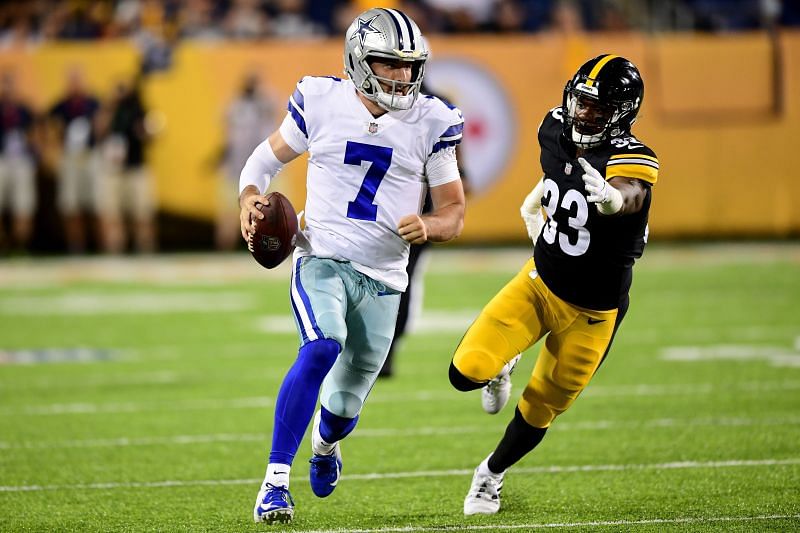 Jacksonville Jaguars quarterback Trevor Lawrence takes notes as he watches  play against the Dallas Cowboys in the second half of a preseason NFL  football game in Arlington, Texas, Sunday, Aug. 29, 2021. (