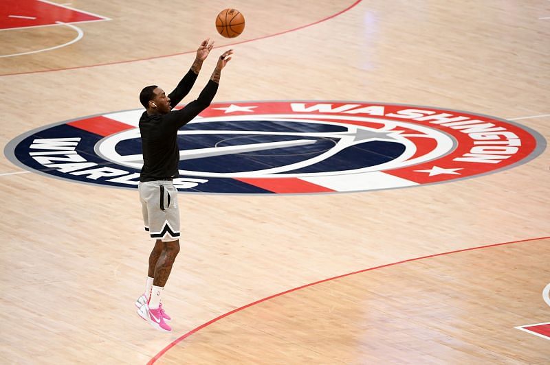 John Wall warms up before a game