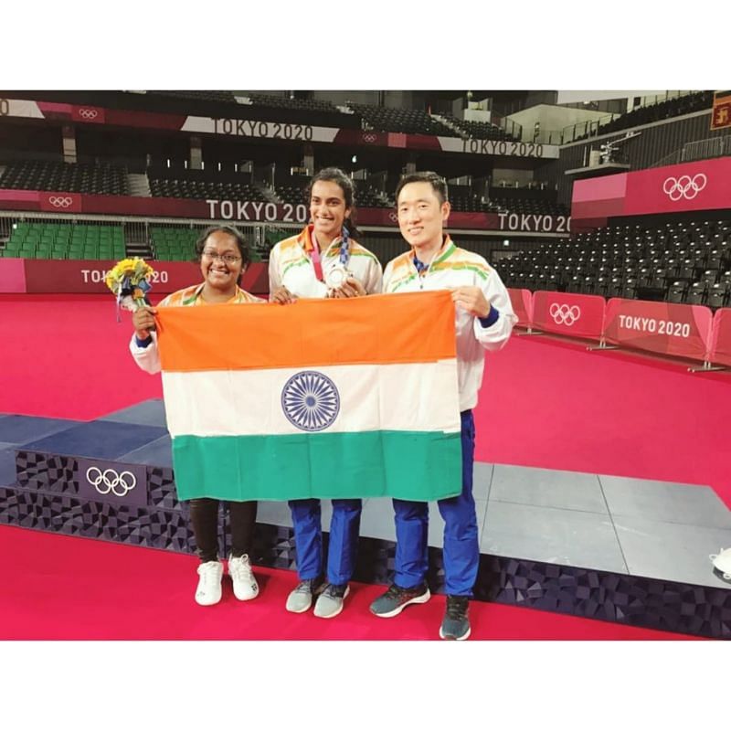 PV Sindhu with her physio Evangeline Baddam (left) and coach Park Tae Sang in Tokyo