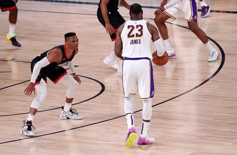 LeBron James and Russell Westbrook (left) playing against each other during a playoff game in 2020.