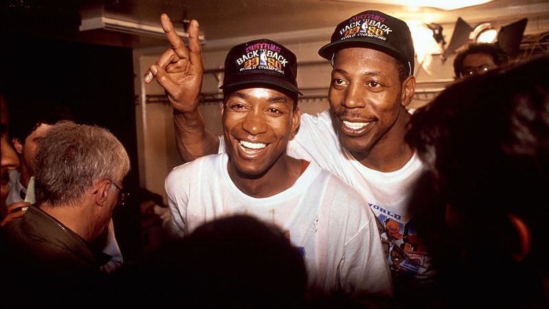 Thomas celebrating the Pistons&#039; 1990 NBA Finals with Vinnie Johnson.